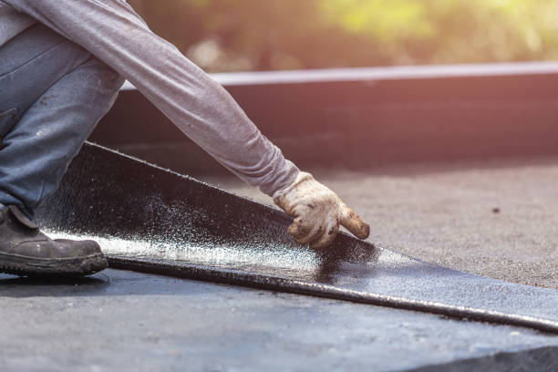 Professional Waterproofing technician working in Macatawa, MI
